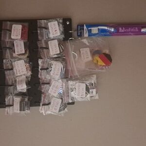 Guitar Strings,  Sun Glasses, Dart Flights/Sharpeners,  Toothpaste,  Etc.